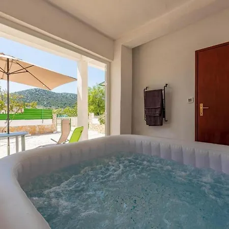 Holiday home Beachfront With Hot Tub, Terrace, And Sea Views In *