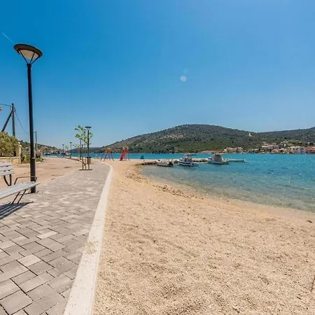 Beachfront With Hot Tub, Terrace, And Sea Views In *